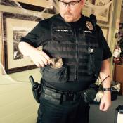 Officer Long with a rescued kitten